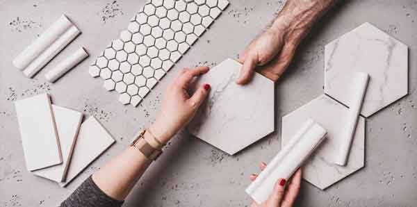 Hands on table with tiles